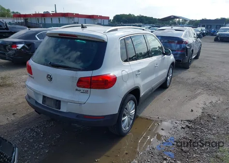 2014 Volkswagen Tiguan Sel из США, поврежденный, VIN WVGBV3AXXEW509665
